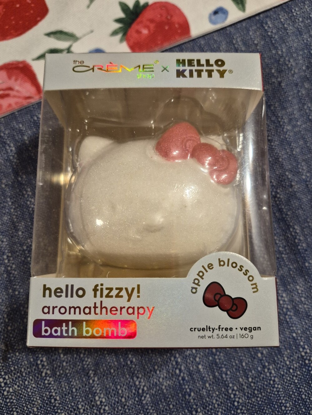 The Crème Shop x Hello Kitty Apple Blossom Bath Bomb in White with Pink Bow